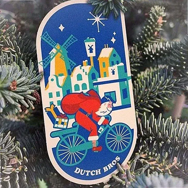 Dutch Bros Sticker Santa on Bicycle Holiday Christmas Blue City
